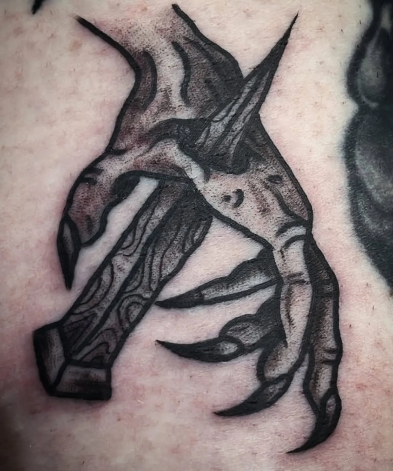 Skeleton hand gripping a dagger tattoo Wolf & Dagger Tattoo Hove